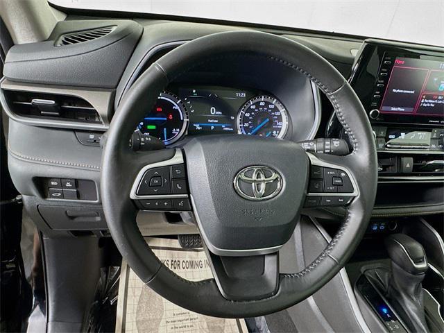 used 2022 Toyota Highlander Hybrid car, priced at $31,499