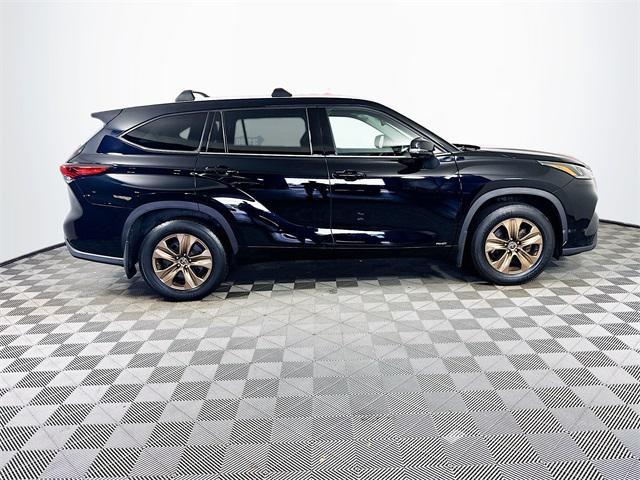 used 2022 Toyota Highlander Hybrid car, priced at $31,499