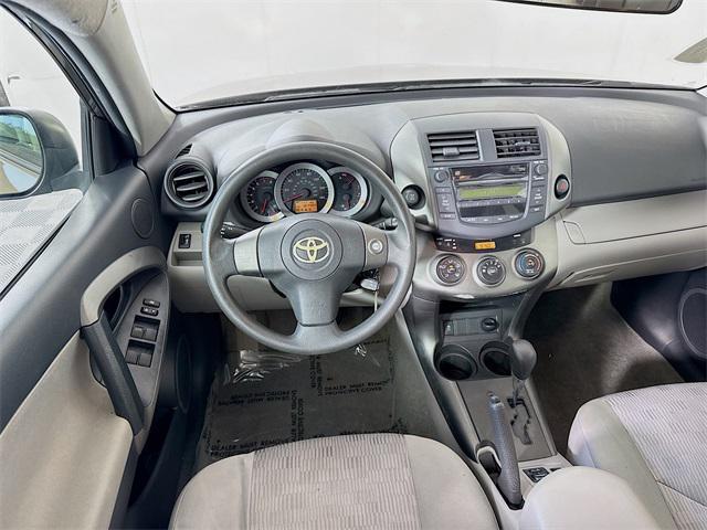 used 2011 Toyota RAV4 car, priced at $10,999
