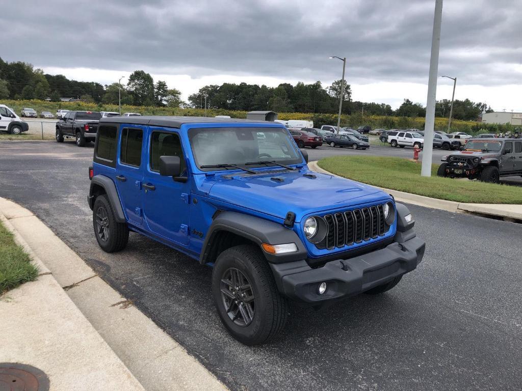 used 2024 Jeep Wrangler car, priced at $32,696
