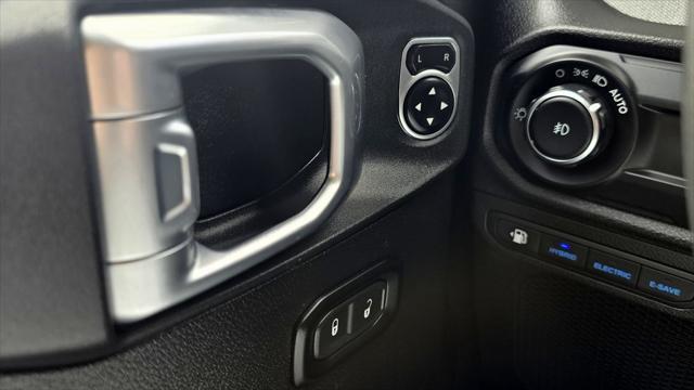 used 2024 Jeep Wrangler 4xe car, priced at $36,947
