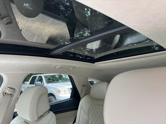 used 2025 Genesis GV70 car, priced at $57,998