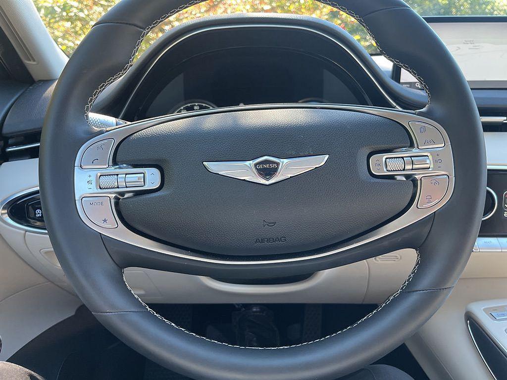 used 2025 Genesis GV70 car, priced at $43,480
