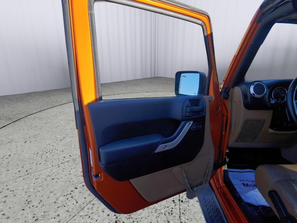 used 2011 Jeep Wrangler Unlimited car, priced at $14,995