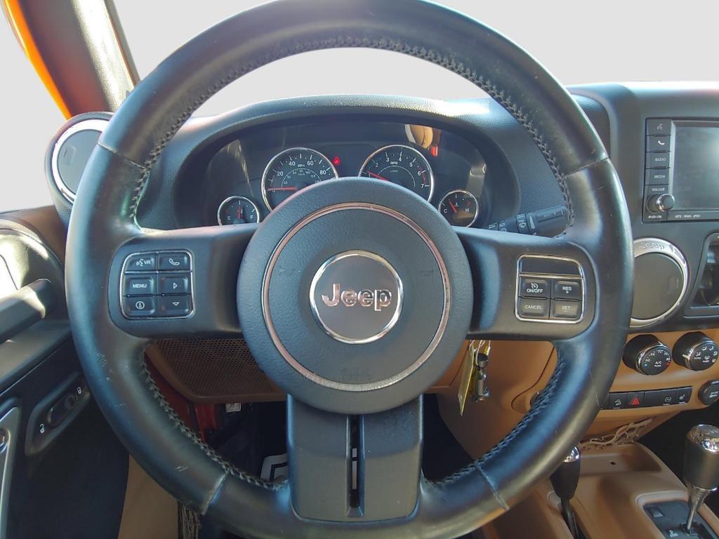 used 2011 Jeep Wrangler Unlimited car, priced at $14,995