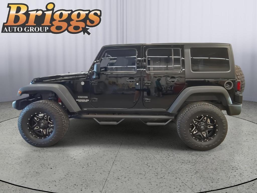used 2013 Jeep Wrangler Unlimited car, priced at $16,995