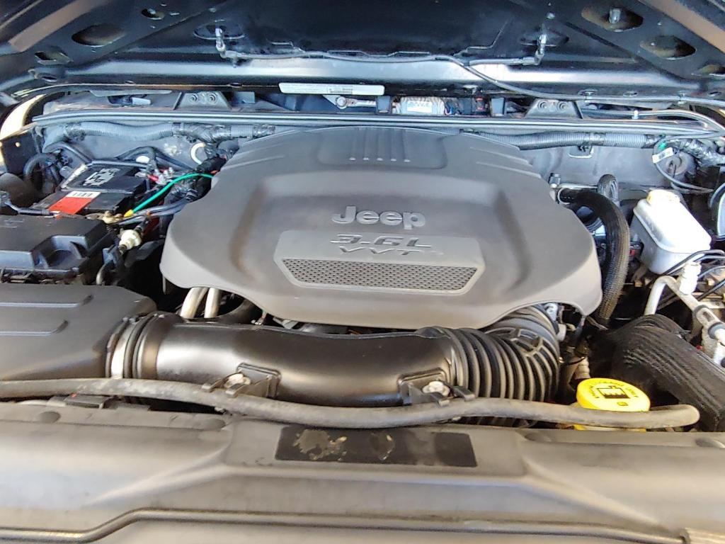 used 2013 Jeep Wrangler Unlimited car, priced at $16,995