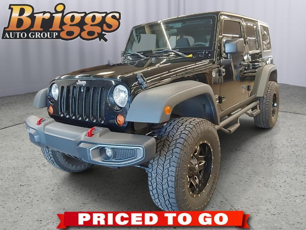 used 2013 Jeep Wrangler Unlimited car, priced at $11,795