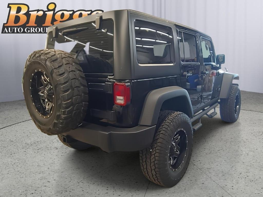used 2013 Jeep Wrangler Unlimited car, priced at $16,995