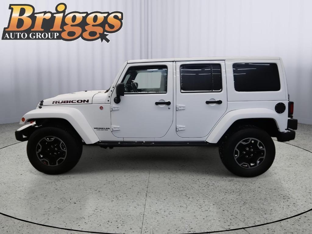 used 2015 Jeep Wrangler Unlimited car, priced at $27,500