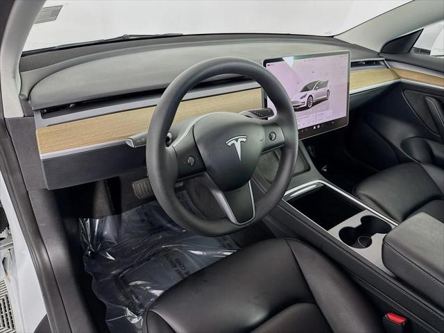 used 2023 Tesla Model 3 car, priced at $25,788