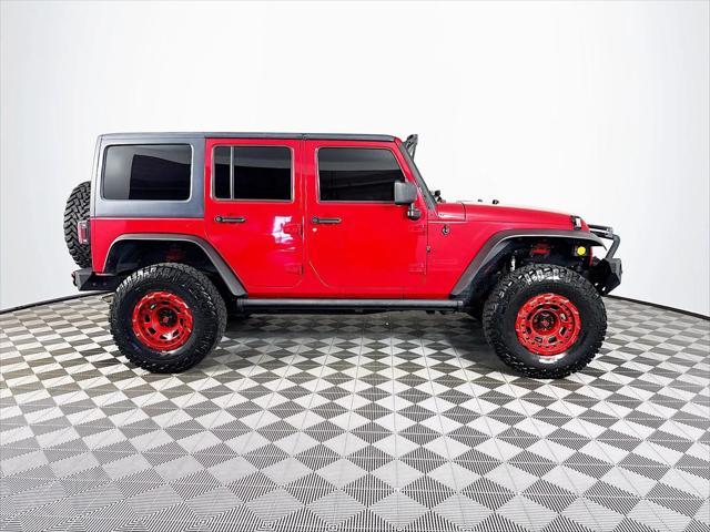 used 2014 Jeep Wrangler Unlimited car, priced at $18,988