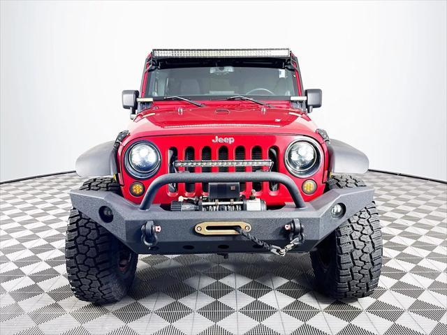 used 2014 Jeep Wrangler Unlimited car, priced at $18,988