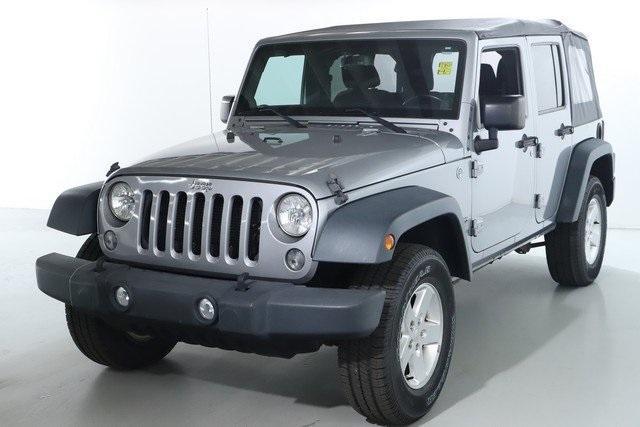 used 2014 Jeep Wrangler Unlimited car, priced at $19,826
