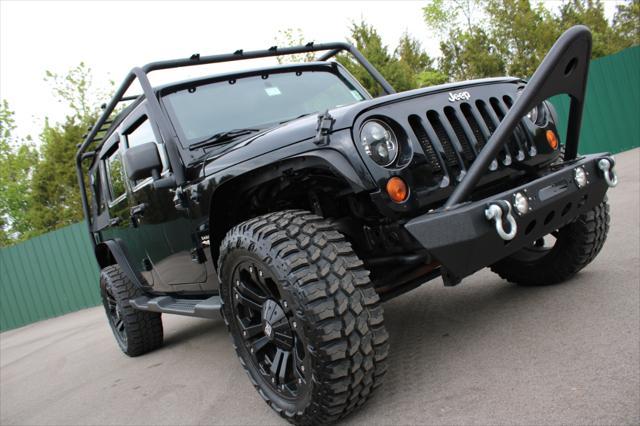 used 2012 Jeep Wrangler Unlimited car, priced at $17,990