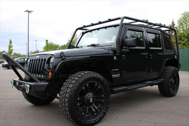 used 2012 Jeep Wrangler Unlimited car, priced at $17,990