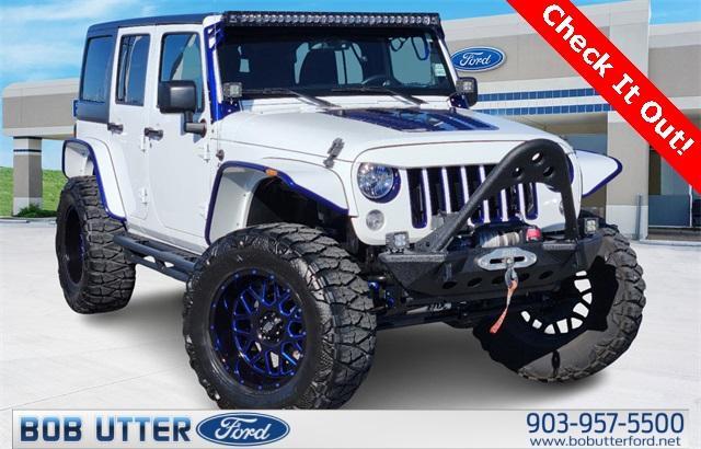 used 2016 Jeep Wrangler Unlimited car, priced at $34,995