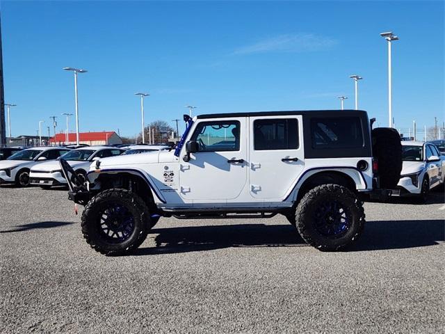 used 2016 Jeep Wrangler Unlimited car, priced at $34,995