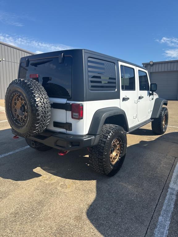 used 2016 Jeep Wrangler Unlimited car, priced at $22,110