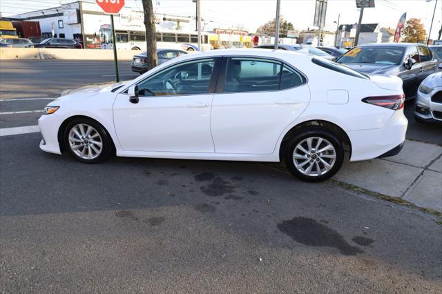 used 2021 Toyota Camry car, priced at $18,875