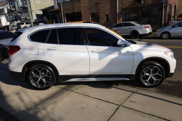 used 2018 BMW X1 car, priced at $13,995