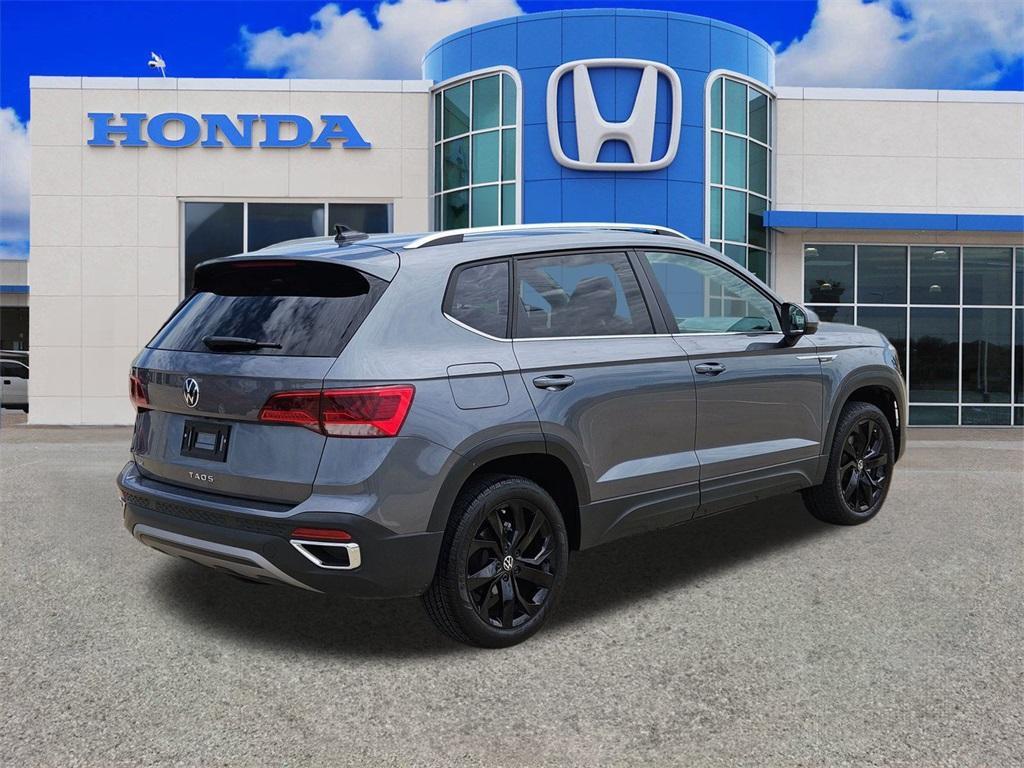 used 2024 Volkswagen Taos car, priced at $23,287