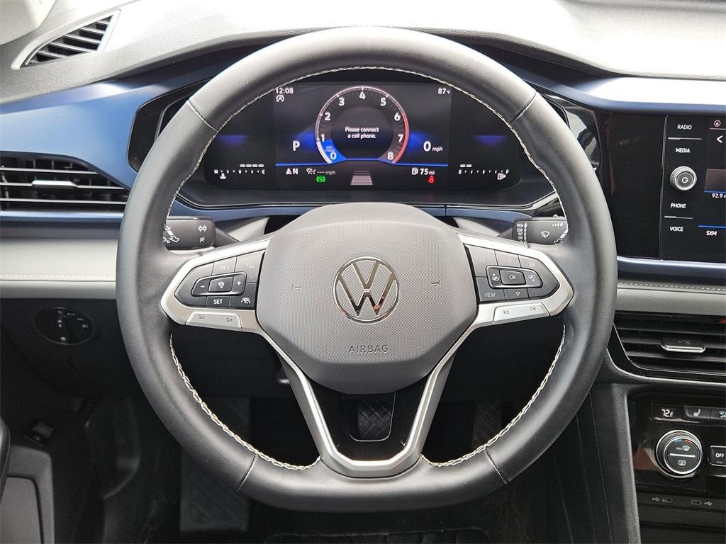 used 2024 Volkswagen Taos car, priced at $23,287