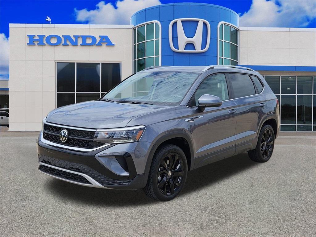 used 2024 Volkswagen Taos car, priced at $23,287