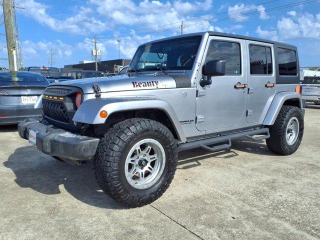 used 2016 Jeep Wrangler Unlimited car, priced at $15,995