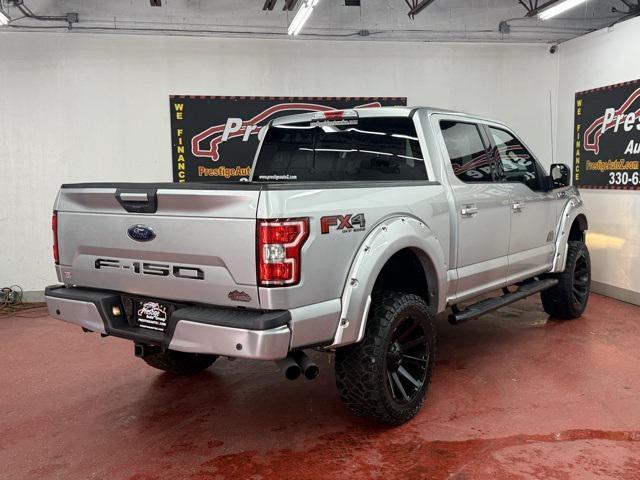 used 2018 Ford F-150 car, priced at $26,801