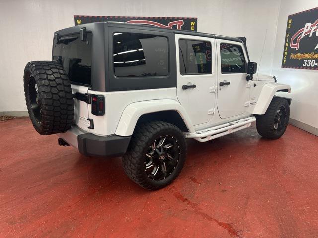 used 2015 Jeep Wrangler Unlimited car, priced at $17,485