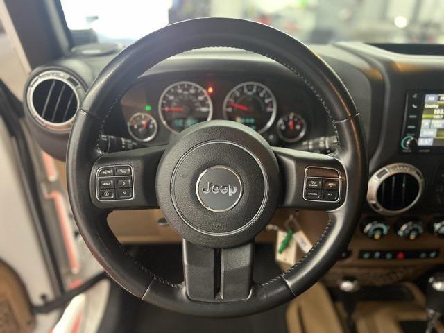 used 2015 Jeep Wrangler Unlimited car, priced at $17,485