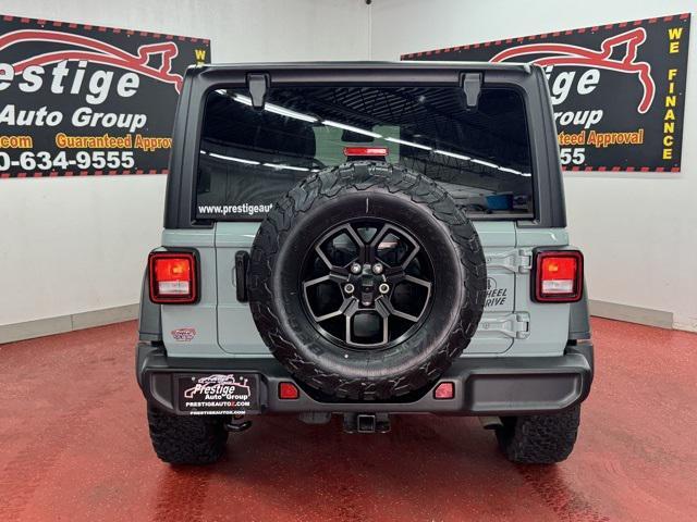 used 2024 Jeep Wrangler car, priced at $35,372