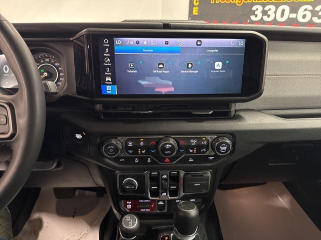 used 2024 Jeep Wrangler car, priced at $35,372