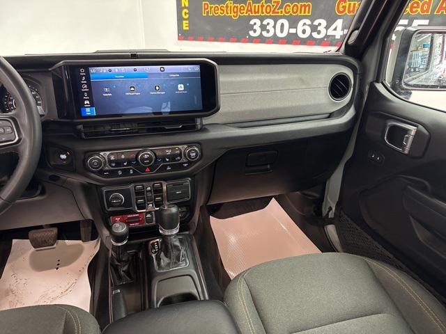 used 2024 Jeep Wrangler car, priced at $35,372