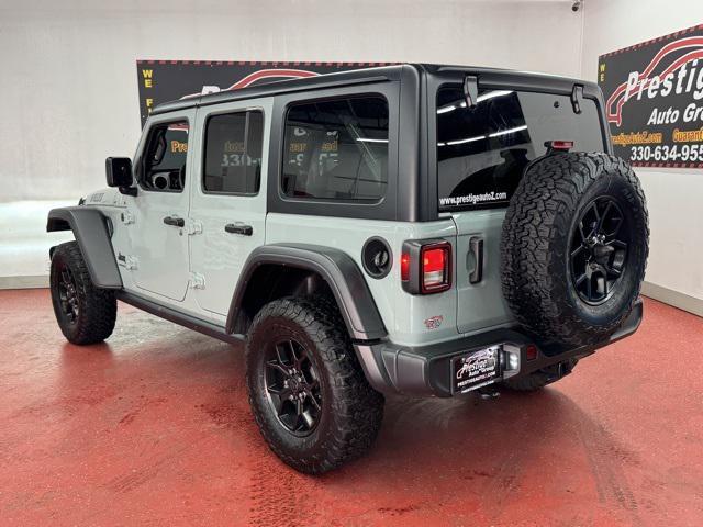 used 2024 Jeep Wrangler car, priced at $35,372