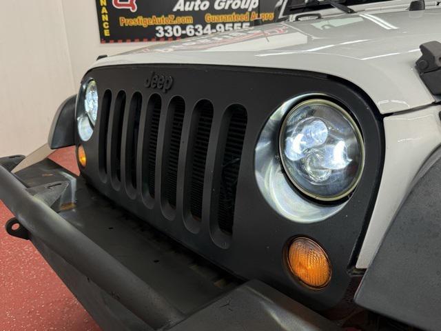 used 2016 Jeep Wrangler Unlimited car, priced at $16,900