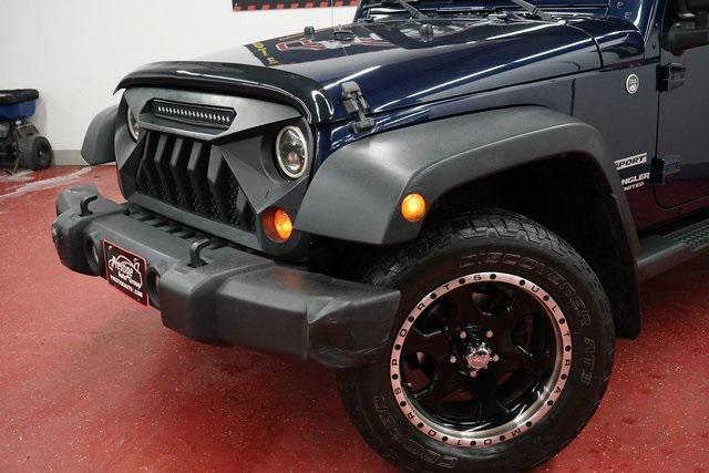 used 2013 Jeep Wrangler Unlimited car, priced at $12,899