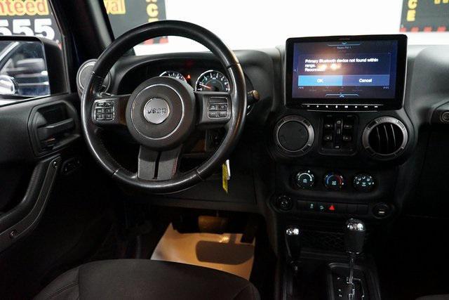 used 2013 Jeep Wrangler Unlimited car, priced at $12,899