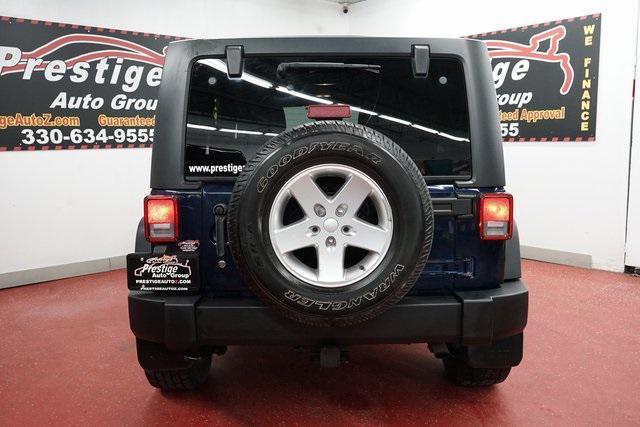 used 2013 Jeep Wrangler Unlimited car, priced at $12,899