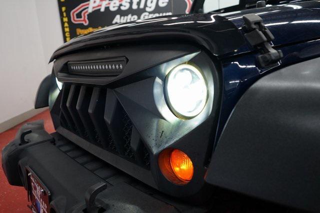 used 2013 Jeep Wrangler Unlimited car, priced at $12,899