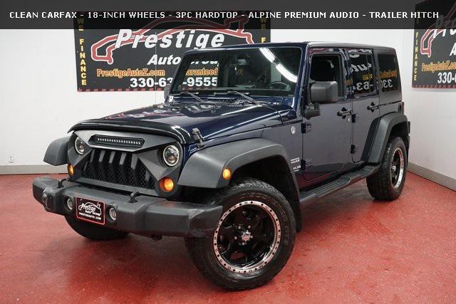 used 2013 Jeep Wrangler Unlimited car, priced at $12,899