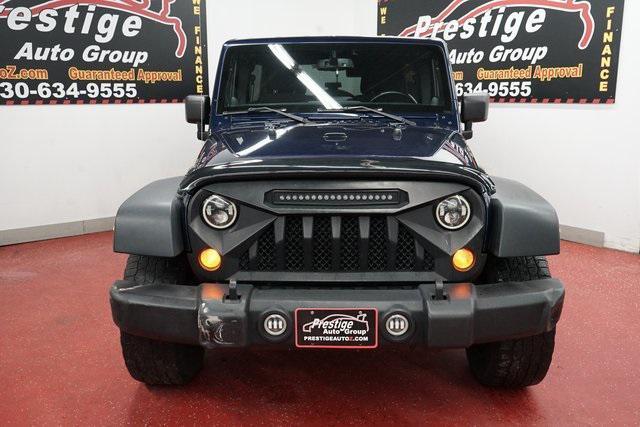 used 2013 Jeep Wrangler Unlimited car, priced at $12,899