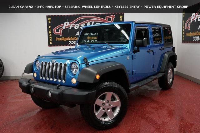 used 2015 Jeep Wrangler Unlimited car, priced at $19,268