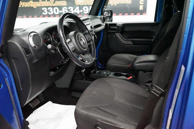 used 2015 Jeep Wrangler Unlimited car, priced at $19,268