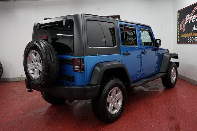 used 2015 Jeep Wrangler Unlimited car, priced at $19,268