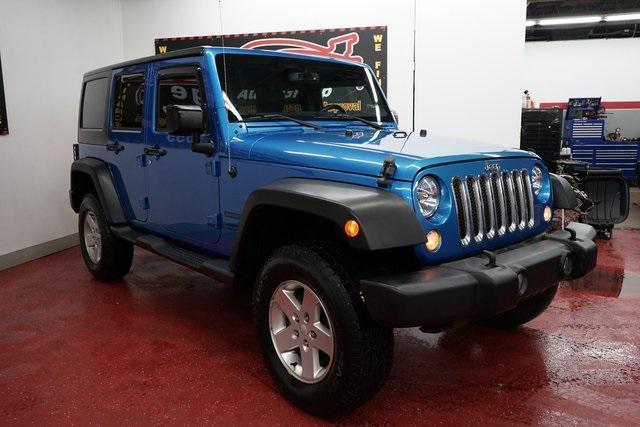 used 2015 Jeep Wrangler Unlimited car, priced at $19,268