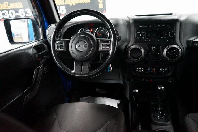 used 2015 Jeep Wrangler Unlimited car, priced at $19,268