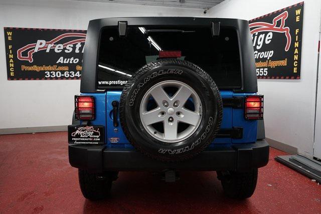 used 2015 Jeep Wrangler Unlimited car, priced at $19,268