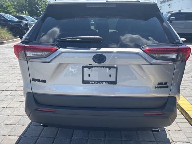 used 2021 Toyota RAV4 Hybrid car, priced at $30,100